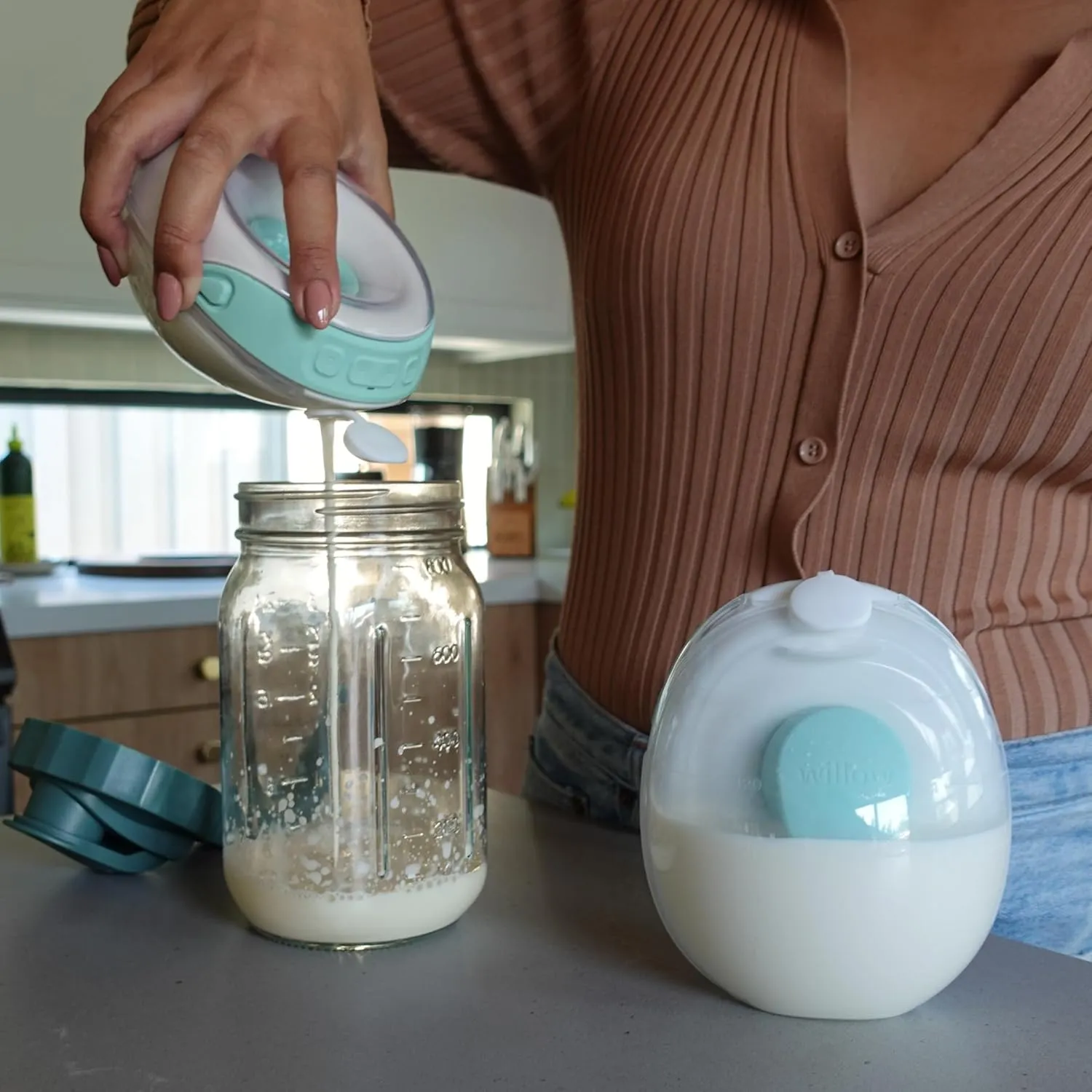 Willow Go - Hands Free Breast Pump - Wearable Breastfeeding Pump - Portable, Electric, Cordless, & 9 Levels of Hospital Grade Suction Strength - Postpartum Essentials - 5oz Reusable Milk Containers